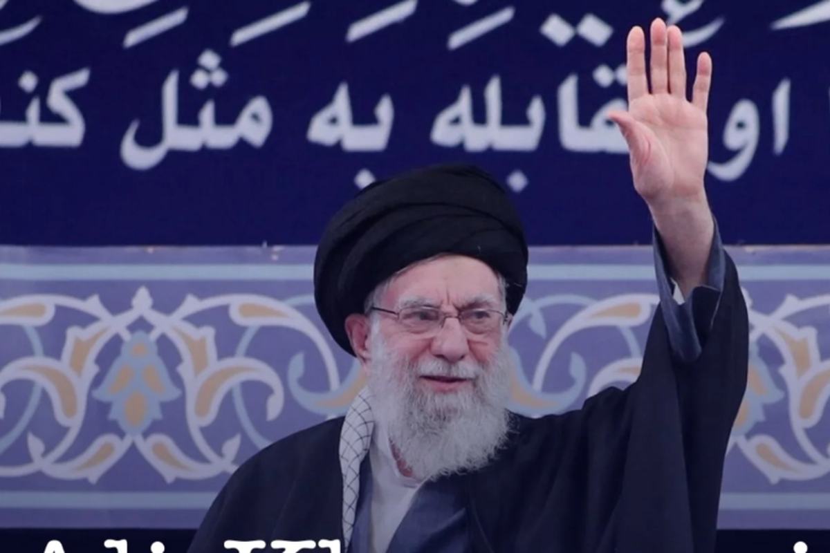 Ayatollah Ali Khamenei waving to a crowd
